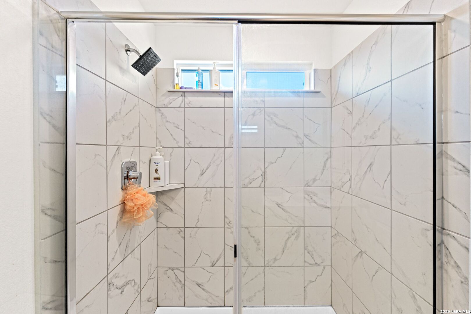 1029 Santiam Street Georgetown, TX 78626 - Photo 29 of 37 a bathroom with a shower and a shower head