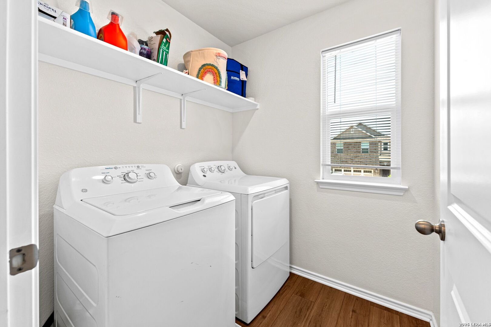 1029 Santiam Street Georgetown, TX 78626 - Photo 31 of 37 a utility room with dryer and washer