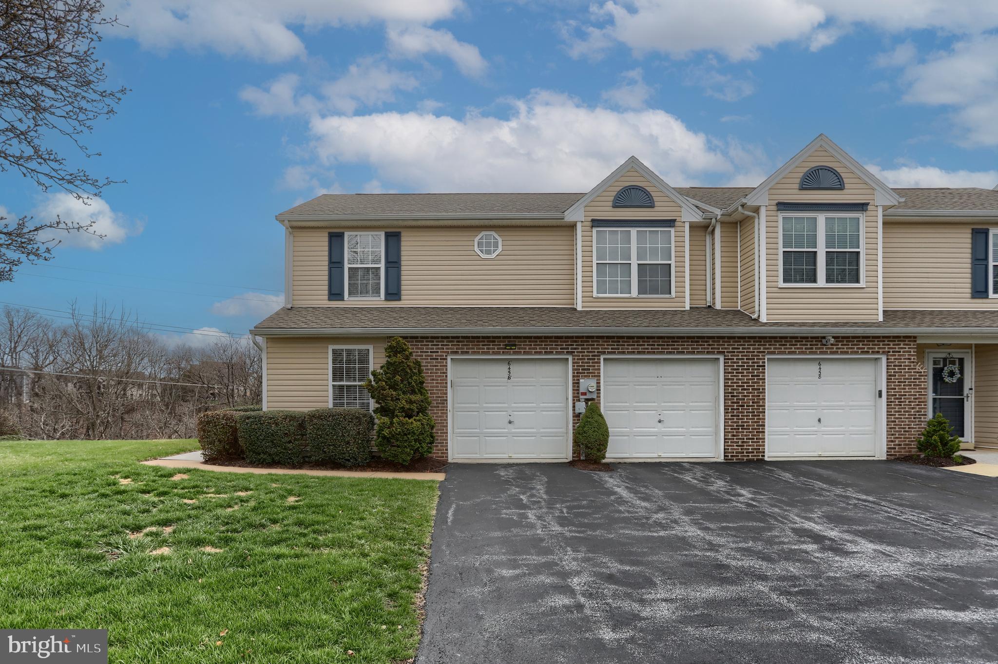 6456 Terrace Court Harrisburg, PA 17111 - Photo 1 of 39 a front view of a house with a garden and garage