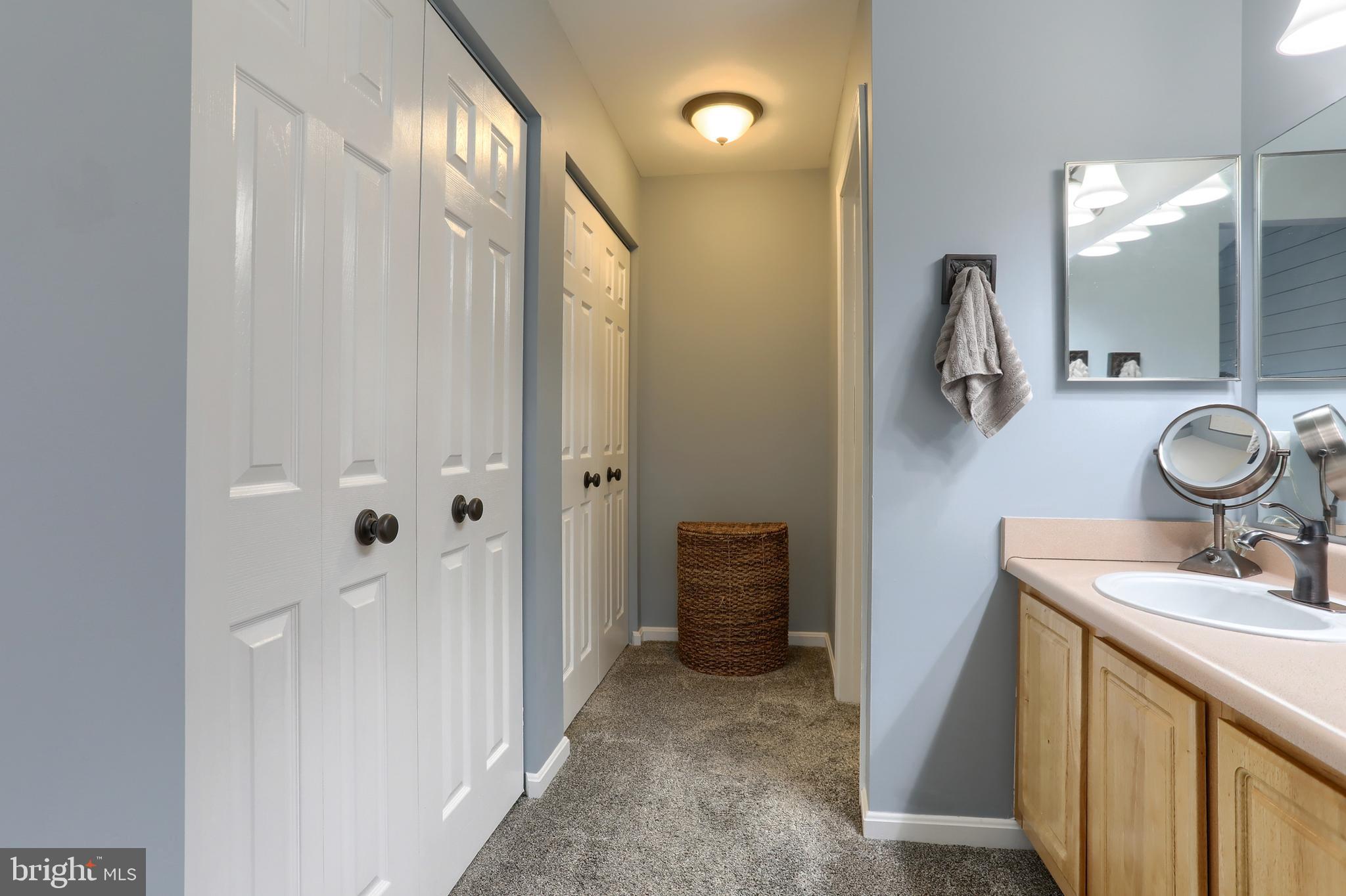 6456 Terrace Court Harrisburg, PA 17111 - Photo 24 of 39 a bathroom with a sink and a mirror