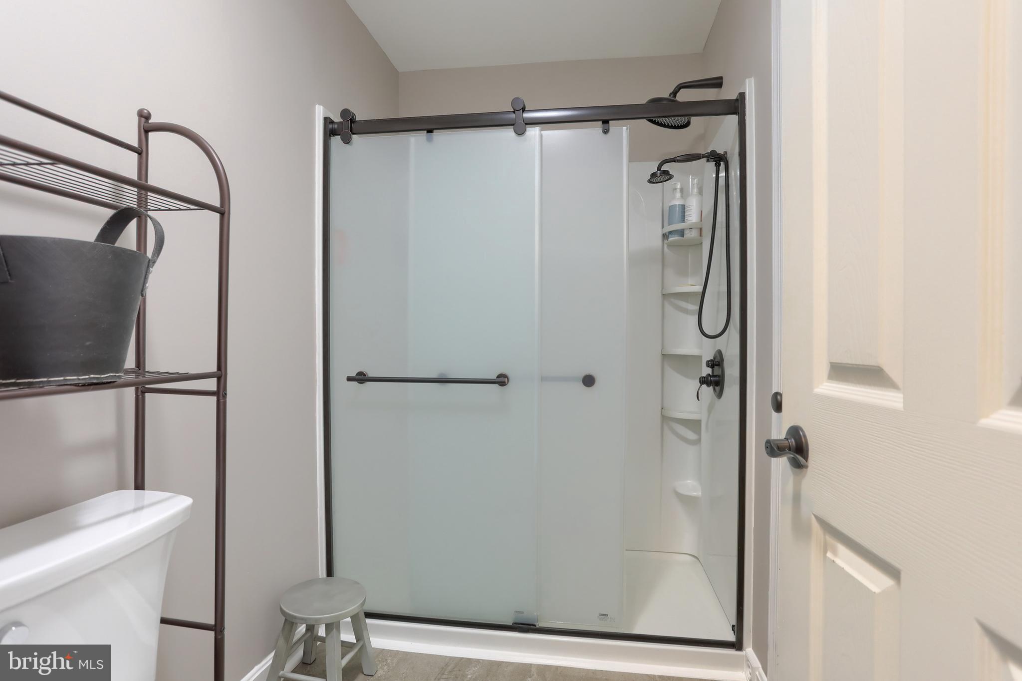 6456 Terrace Court Harrisburg, PA 17111 - Photo 25 of 39 a bathroom with a shower and a toilet