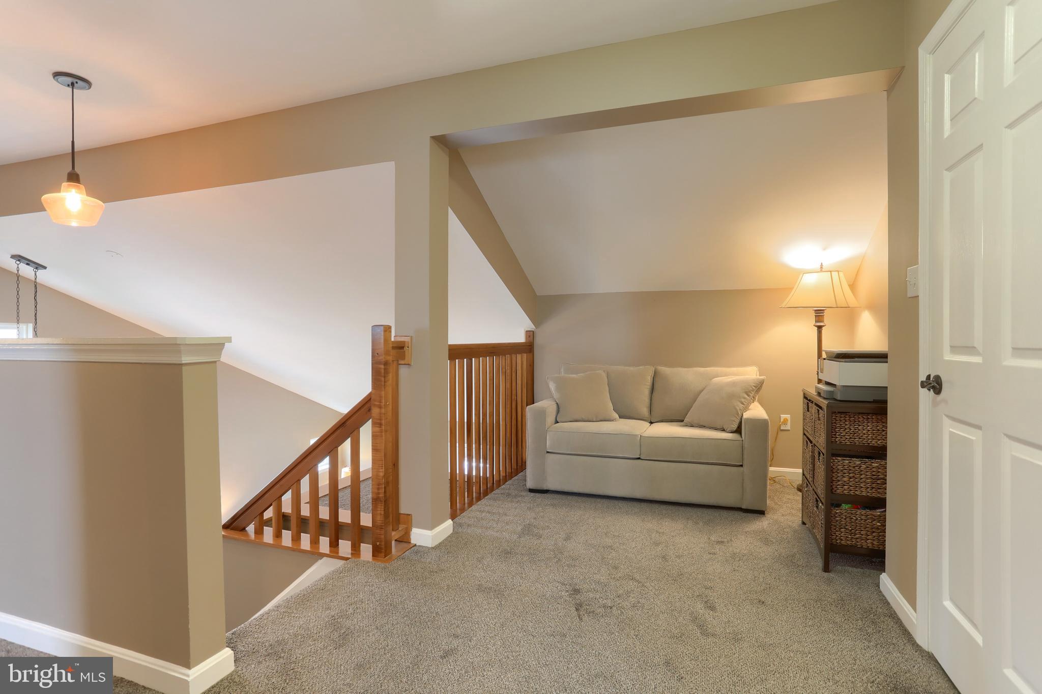 6456 Terrace Court Harrisburg, PA 17111 - Photo 26 of 39 a living room with furniture and a ceiling fan
