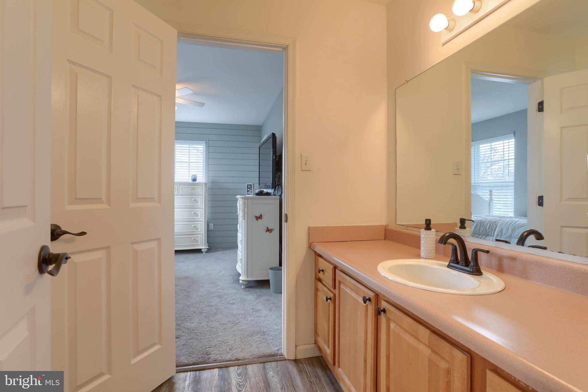 6456 Terrace Court Harrisburg, PA 17111 - Photo 30 of 39 a bathroom with a sink double vanity and a shower