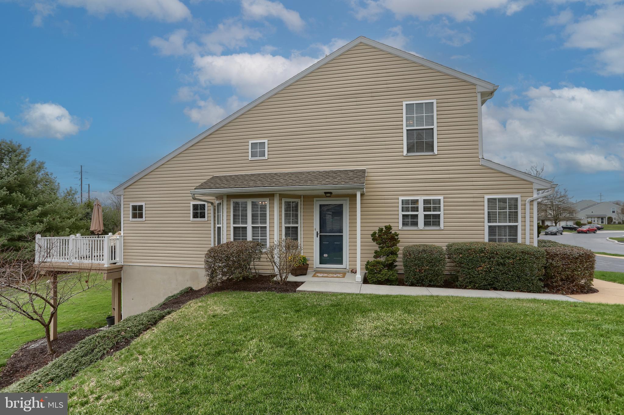 6456 Terrace Court Harrisburg, PA 17111 - Photo 3 of 39 a front view of a house with a garden