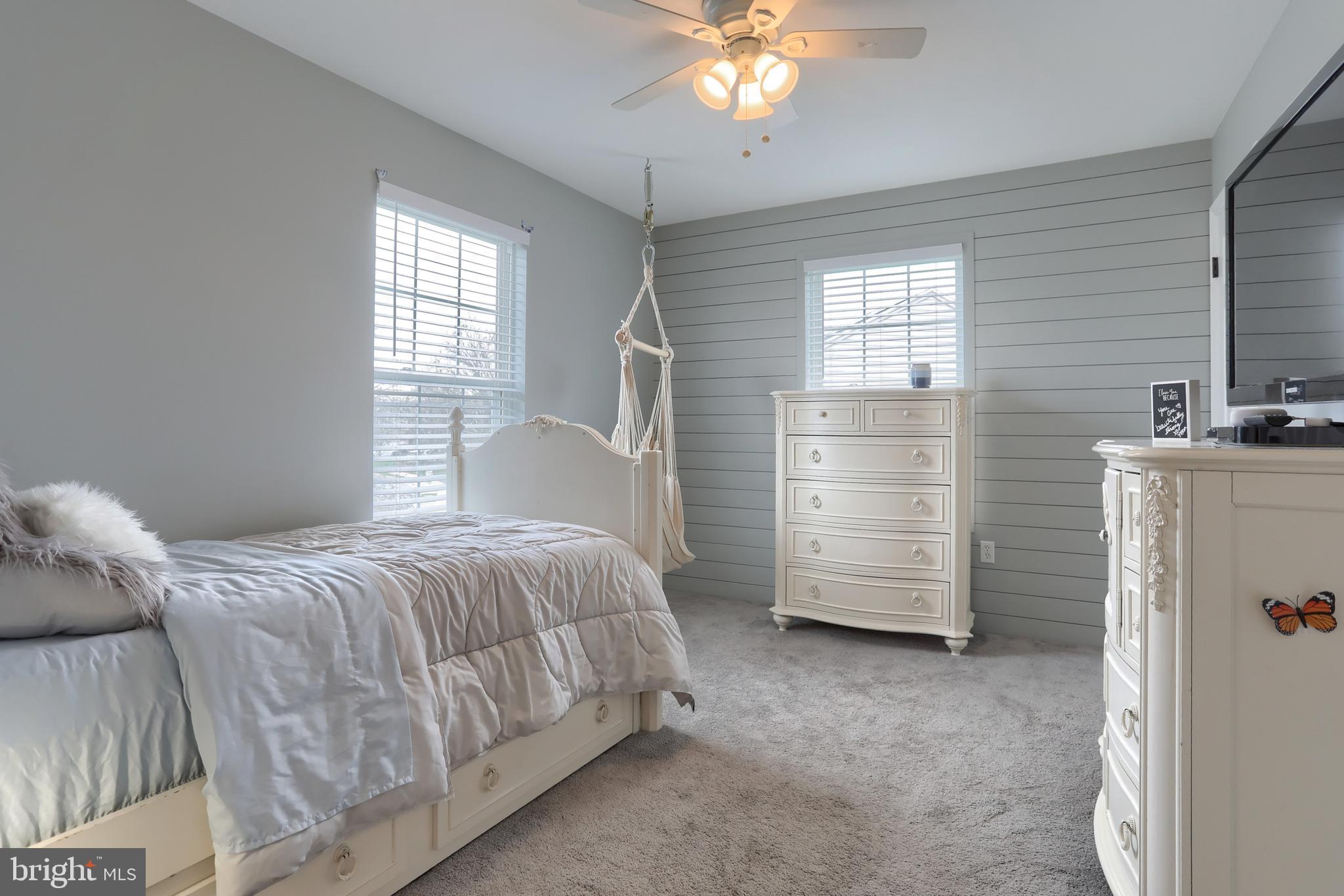 6456 Terrace Court Harrisburg, PA 17111 - Photo 32 of 39 a bedroom with a bed and a chandelier