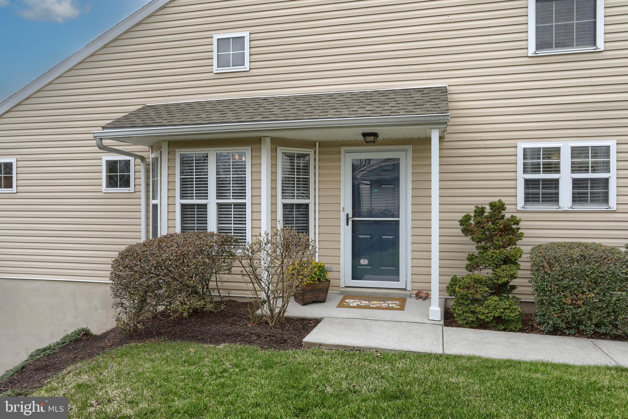 6456 Terrace Court Harrisburg, PA 17111 - Photo 4 of 39 a front view of a house with garden