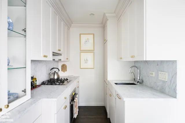 a dining room with furniture window wooden floor and garden view