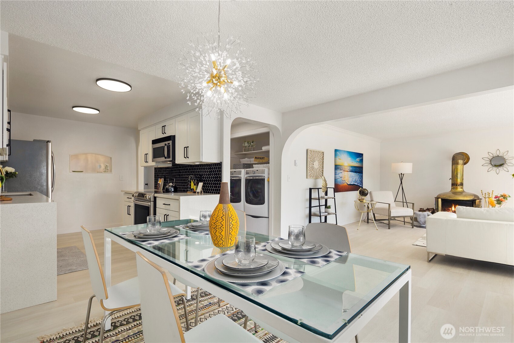 22532 6th Avenue South, Unit A2 Seattle, WA 98198 - Photo 12 of 35 a living room with fireplace furniture and a wooden floor