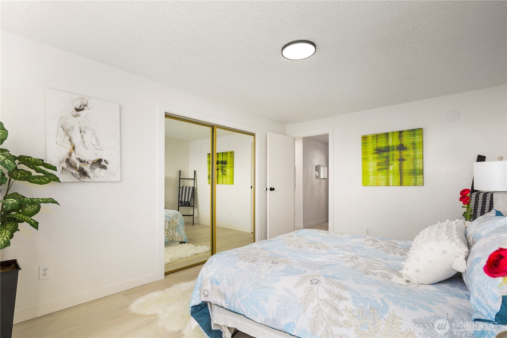 22532 6th Avenue South, Unit A2 Seattle, WA 98198 - Photo 20 of 35 a bedroom with a bed and a window