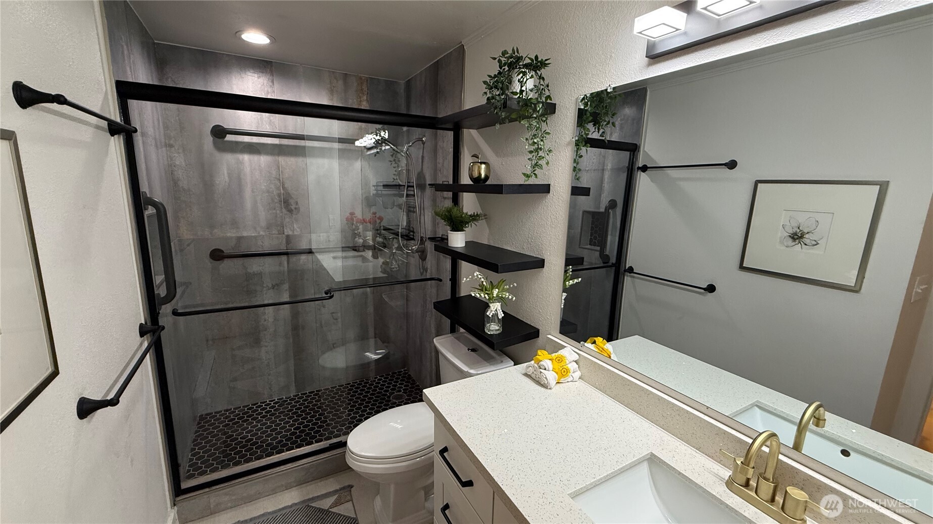 22532 6th Avenue South, Unit A2 Seattle, WA 98198 - Photo 22 of 35 a bathroom with a sink toilet and shower