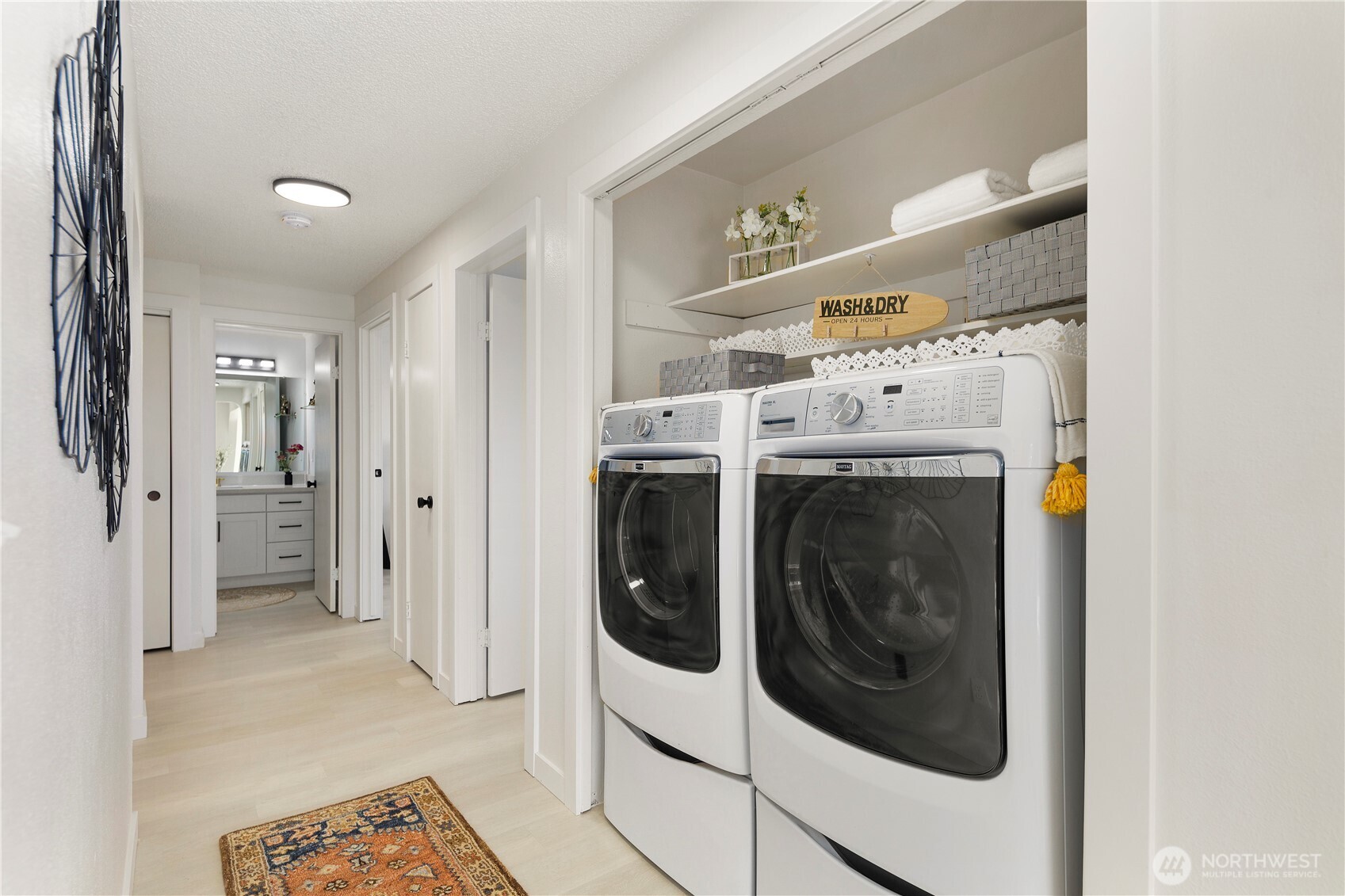 22532 6th Avenue South, Unit A2 Seattle, WA 98198 - Photo 26 of 35 a utility room with dryer and washer