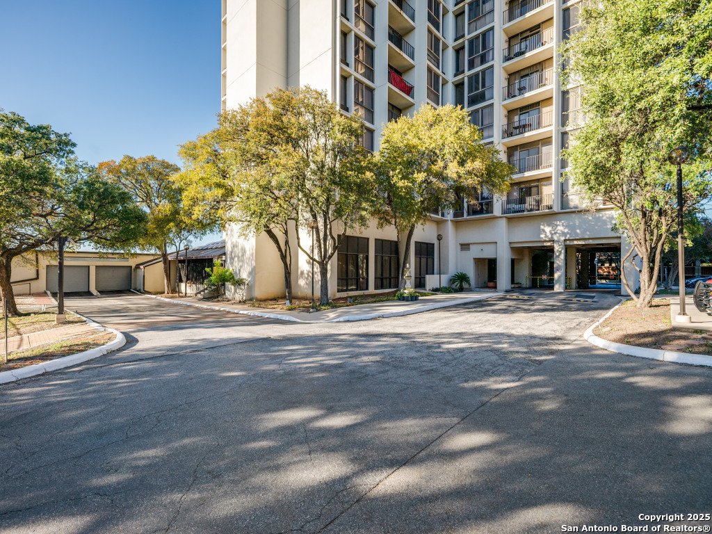 7701 Wurzbach Road, Unit 807 San Antonio, TX 78229 - Photo 2 of 20 a view of a building with a street