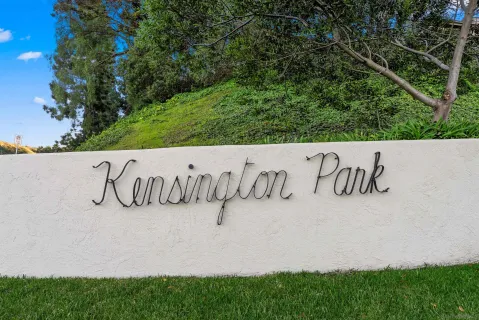a street sign sitting on top of a building
