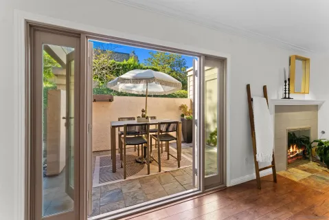 a view of a livingroom with furniture and front door