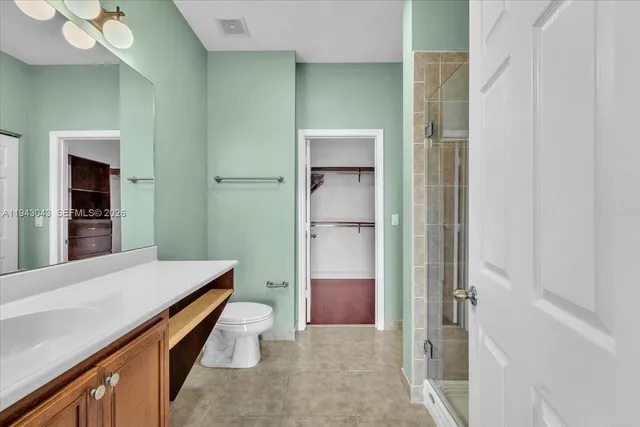 a view of a bathroom from the hallway