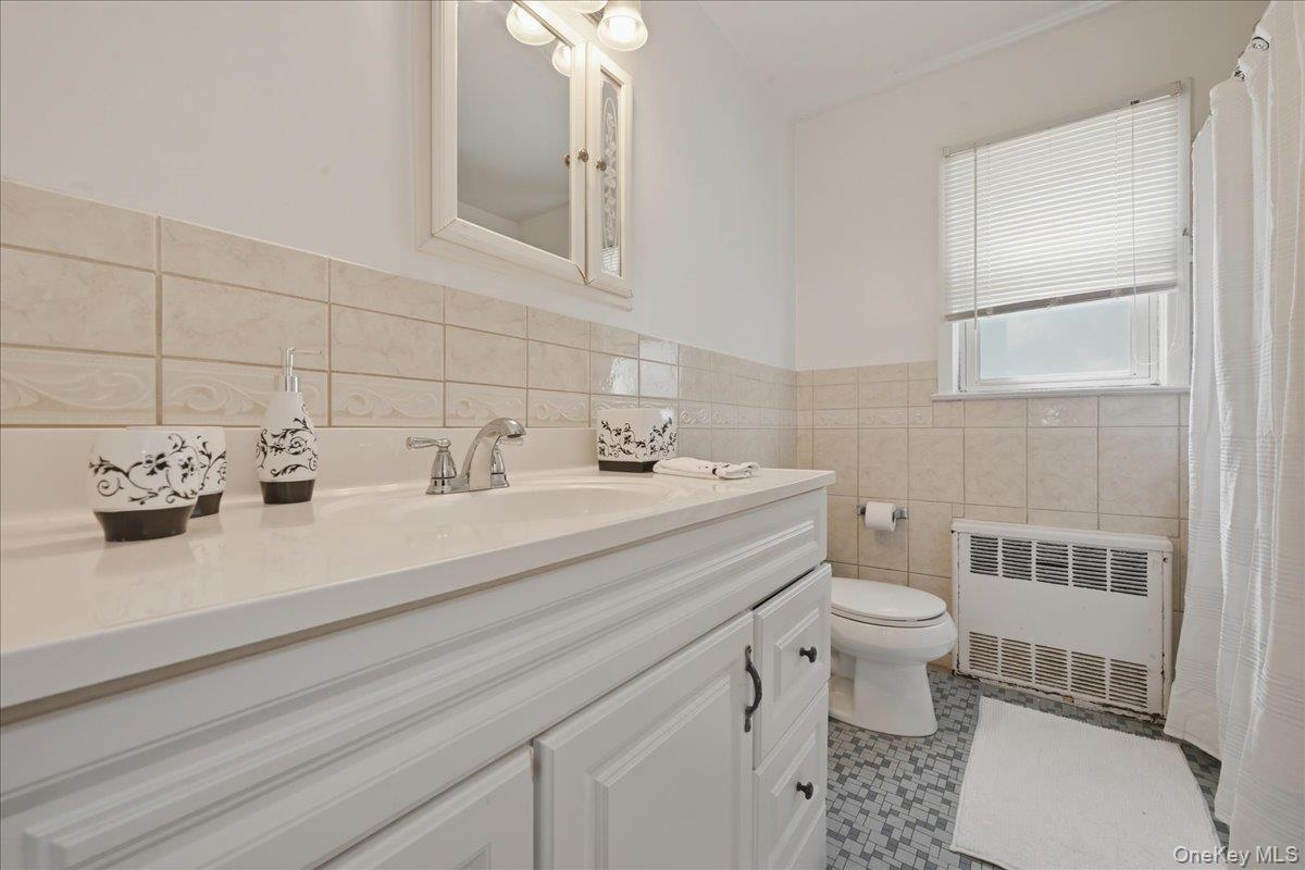 51 Hickory Road Port Washington, NY 11050 - Photo 7 of 16 Bathroom First Floor