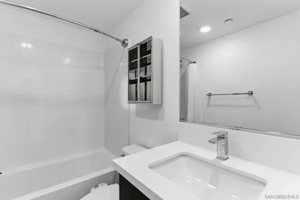 a bathroom with a sink and a bathtub