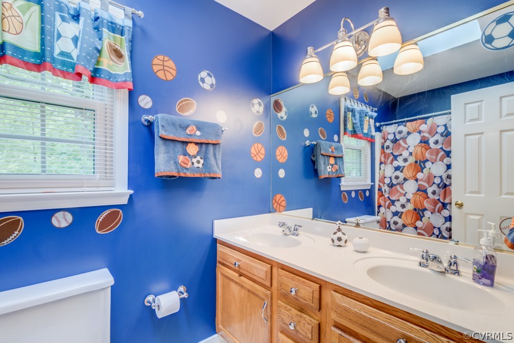 9713 Snowhill Road North Chesterfield, VA 23235 - Photo 23 of 32 Hall bath with double vanity...and decals are remo