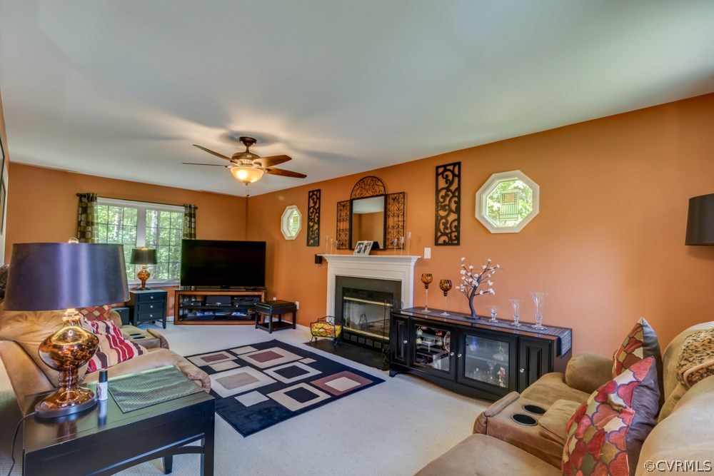 9713 Snowhill Road North Chesterfield, VA 23235 - Photo 8 of 32 Family room with wood-burning fireplace.