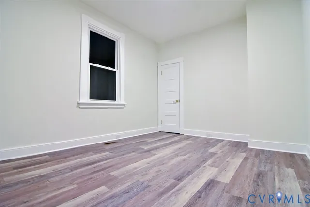 a view of storage and utility room with racks on the wall