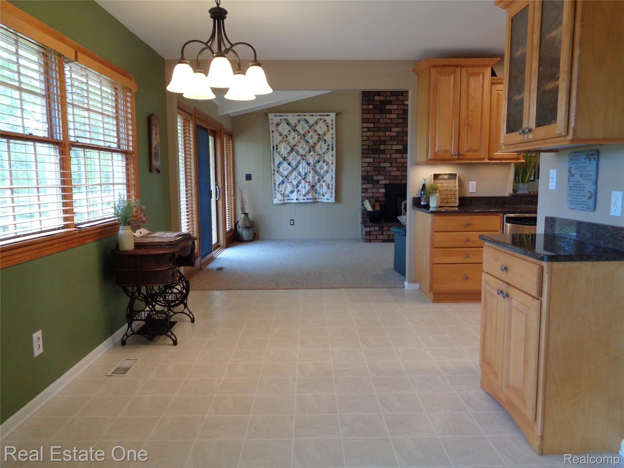 2572 Lake George Road Oakland, MI 48363 - Photo 20 of 83 Dining space with open view toward great room, there is a walk-in pantry to the right, not shown.
