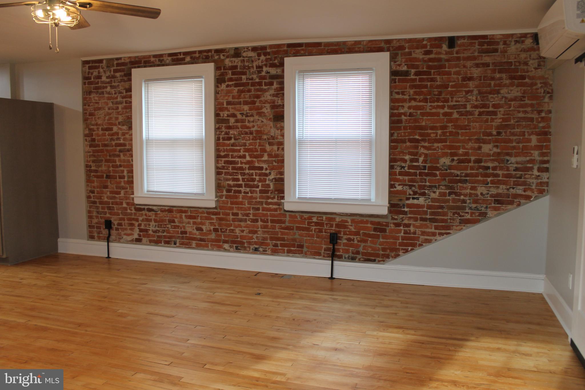 415 West Broad Street Quakertown, PA 18951 - Photo 15 of 28 Exposed Brick Wall