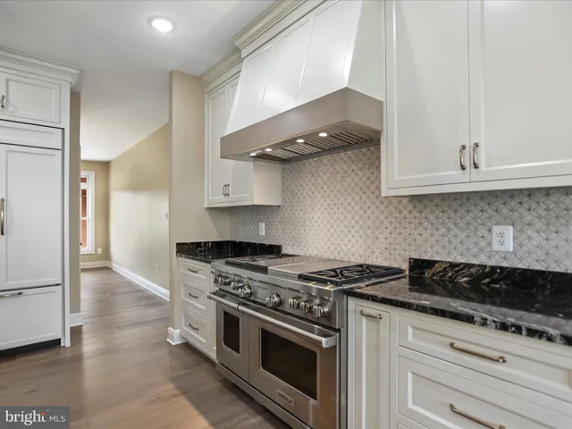 a view of a balcony with wooden floor