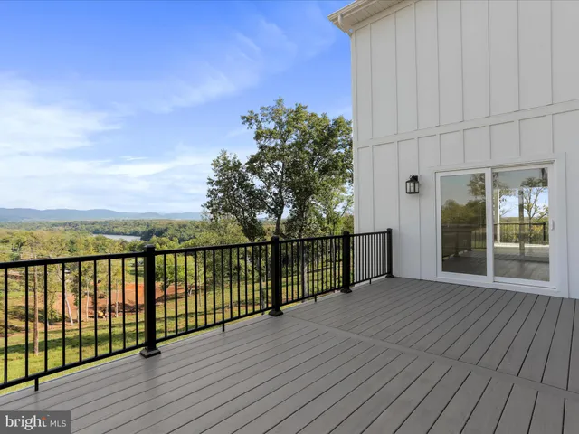 a bathroom with a bathtub and a toilet