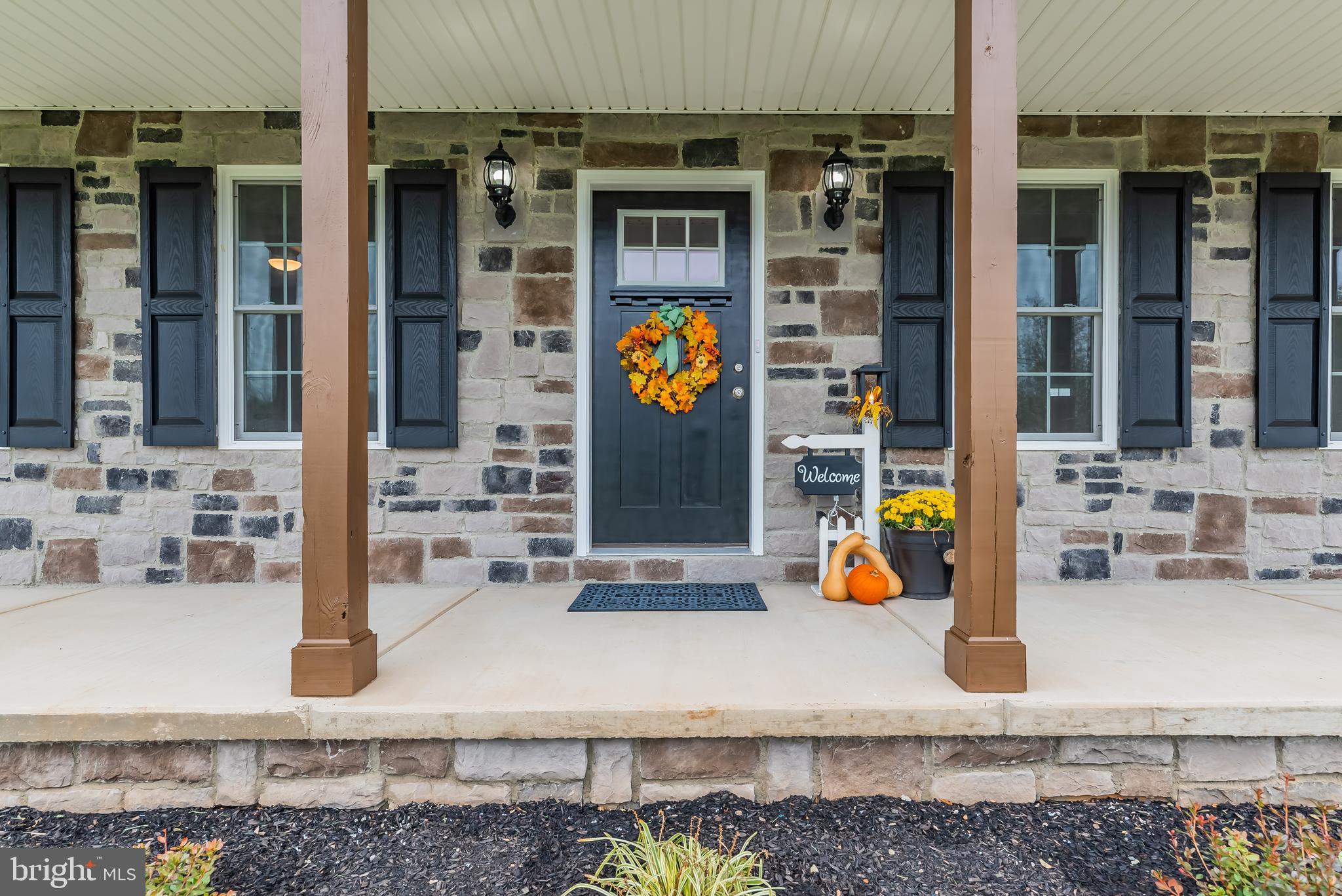Inviting covered front porch welcomes you home!