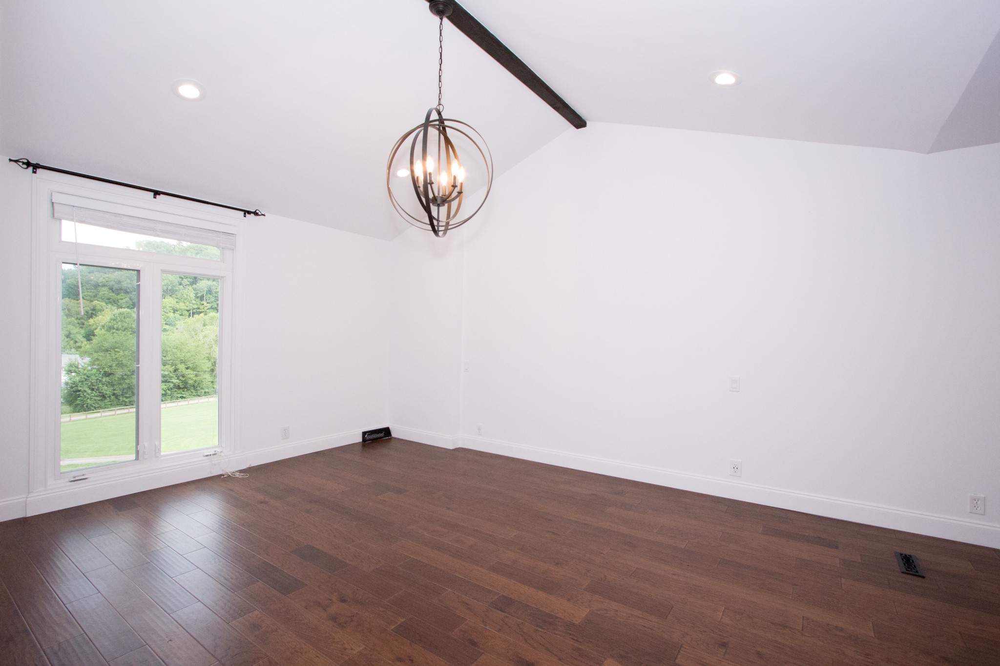 5380 Parker Branch Road Franklin, TN 37064 - Photo 22 of 50 Fully remodeled master ensuite with vaulted ceilings and stained wood beam.