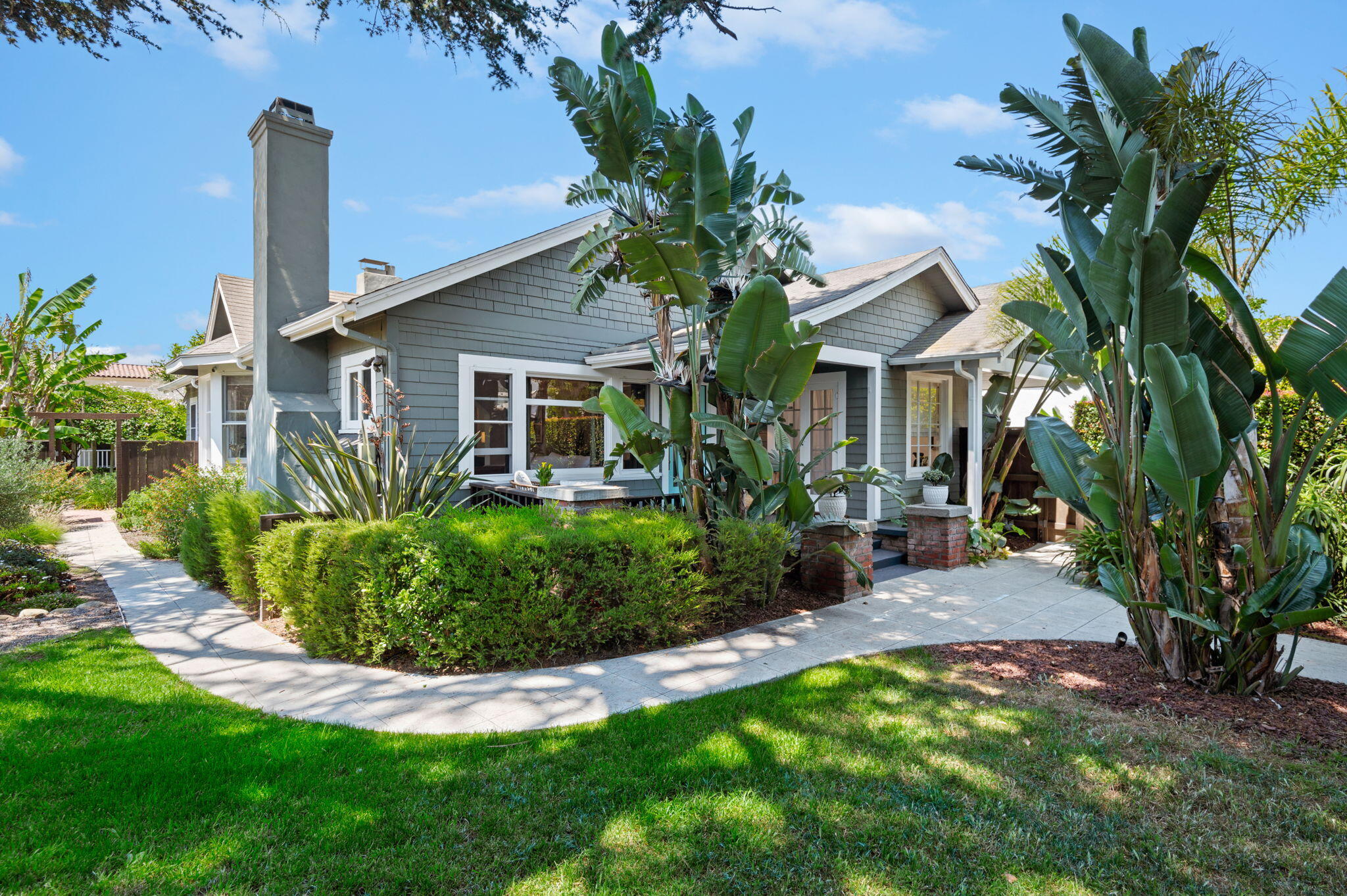 1725 San Andres Street Santa Barbara, CA 93101 - Photo 1 of 44 a front view of a house with garden