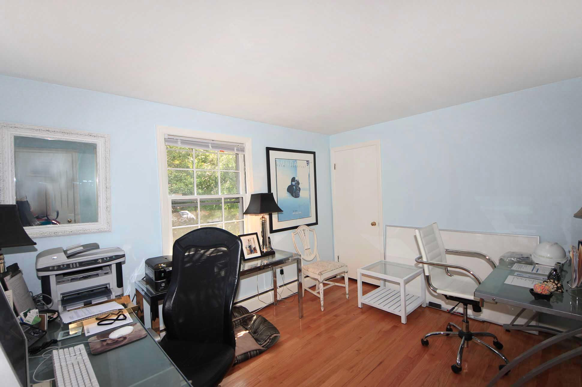 43 Rural Drive New Canaan, CT 06840 - Photo 13 of 26 a view of a workspace with furniture and a window