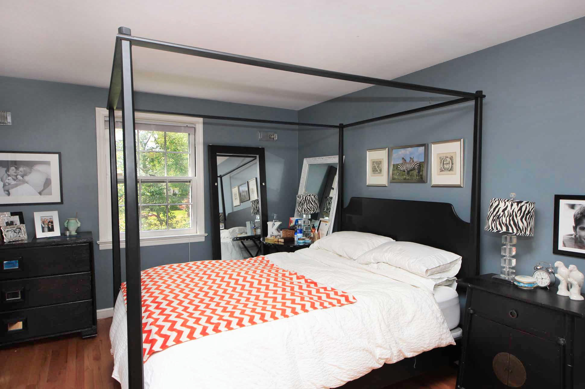 43 Rural Drive New Canaan, CT 06840 - Photo 14 of 26 a bed sitting in a bedroom next to a window