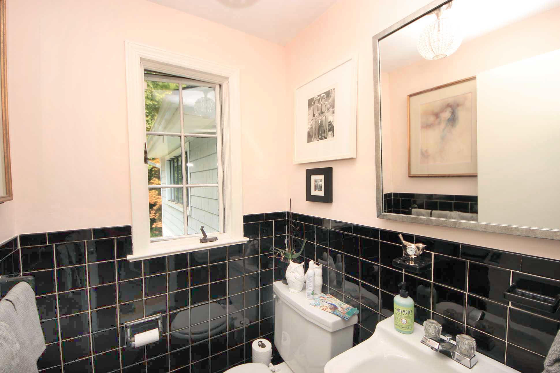 43 Rural Drive New Canaan, CT 06840 - Photo 17 of 26 a bathroom with a toilet a sink and mirror