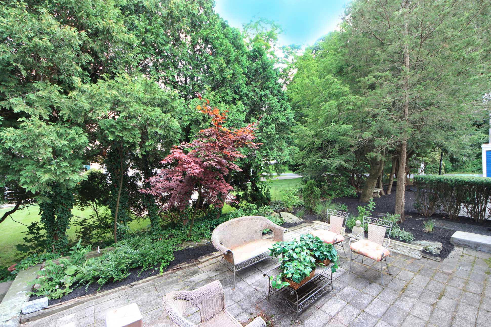 43 Rural Drive New Canaan, CT 06840 - Photo 18 of 26 a view of a garden with patio