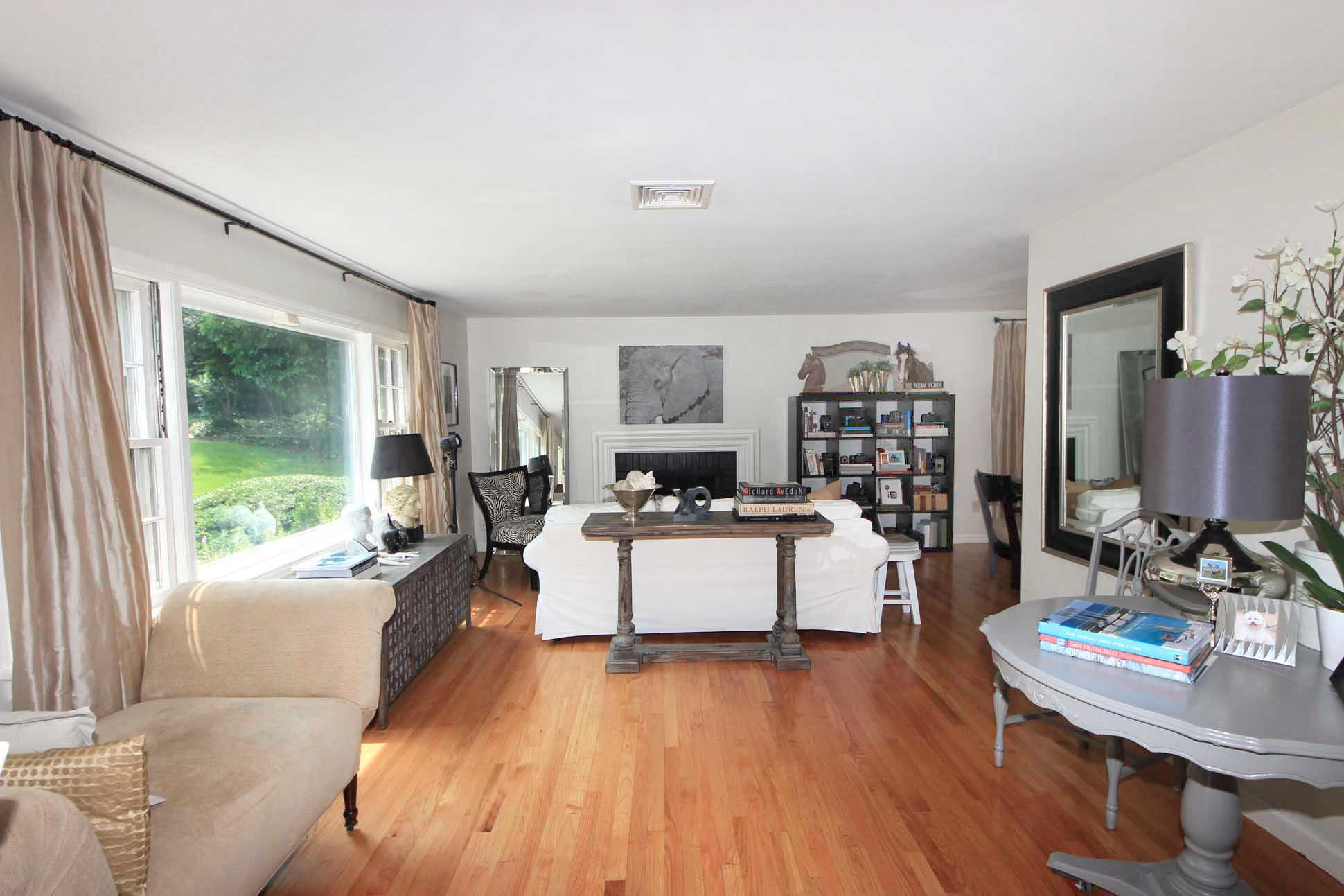 43 Rural Drive New Canaan, CT 06840 - Photo 2 of 26 a living room with furniture and a large window