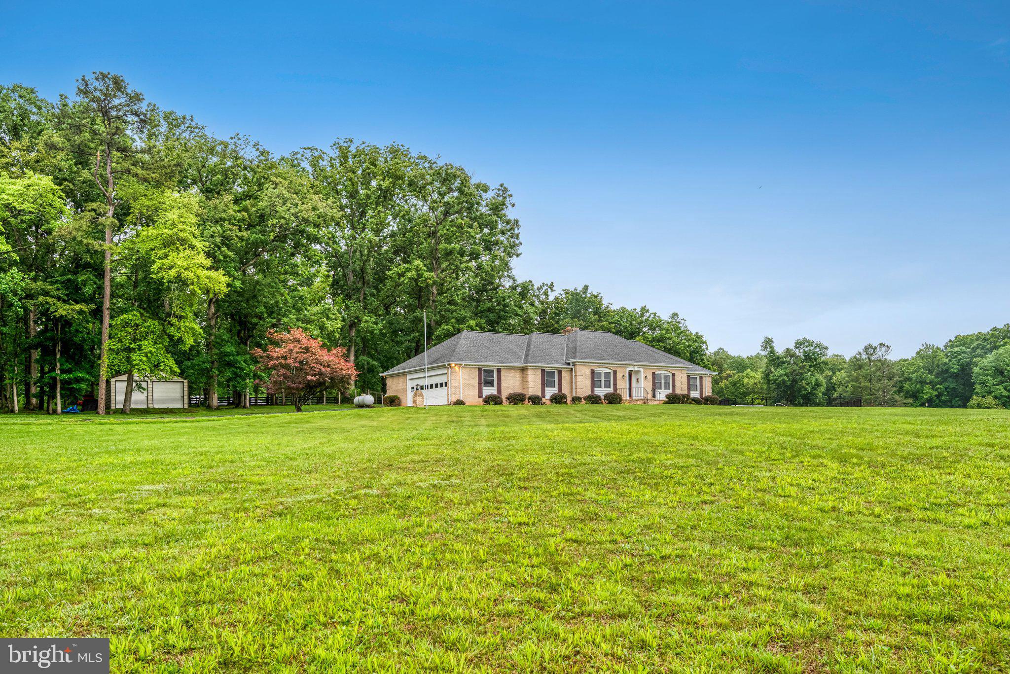 7961 Leeds Manor Road Marshall, VA 20115 - Photo 39 of 40 a house with a garden