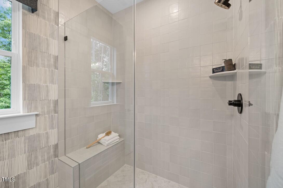 4504 Mint Leaf Lane Raleigh, NC 27612 - Photo 32 of 42 a bathroom with a shower