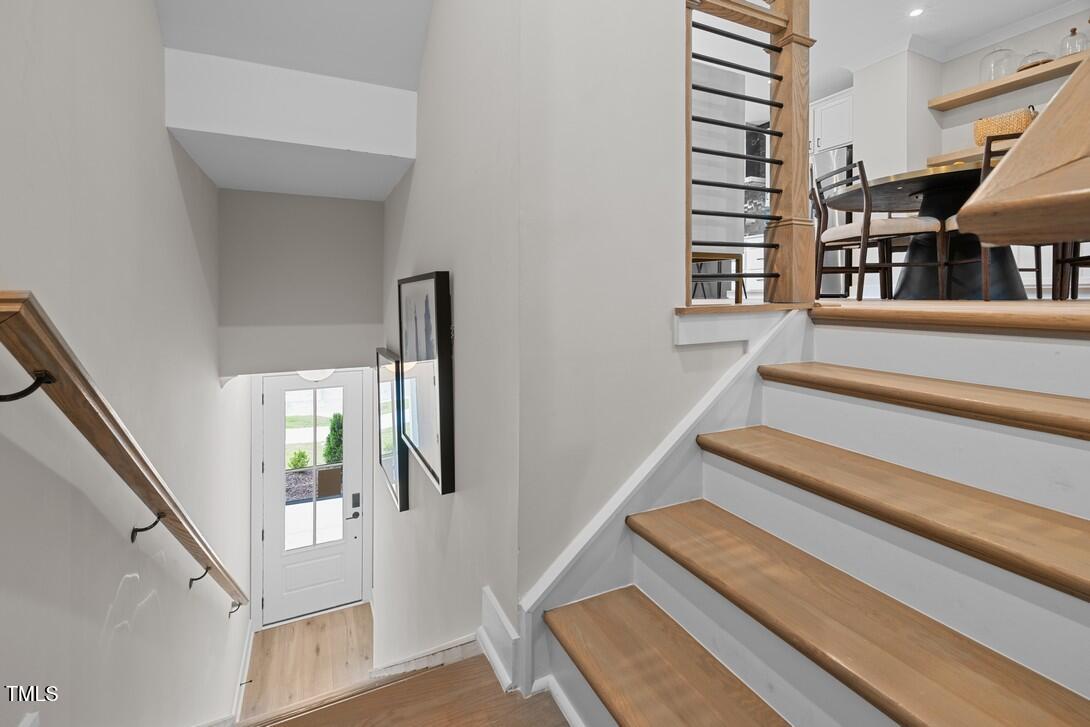 4504 Mint Leaf Lane Raleigh, NC 27612 - Photo 37 of 42 a view of entryway and hall with wooden floor