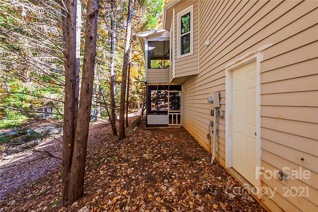 2115 Bon Villa Way Tega Cay, SC 29708 - Photo 14 of 15 a view of a pathway of a house with backyard and backyard