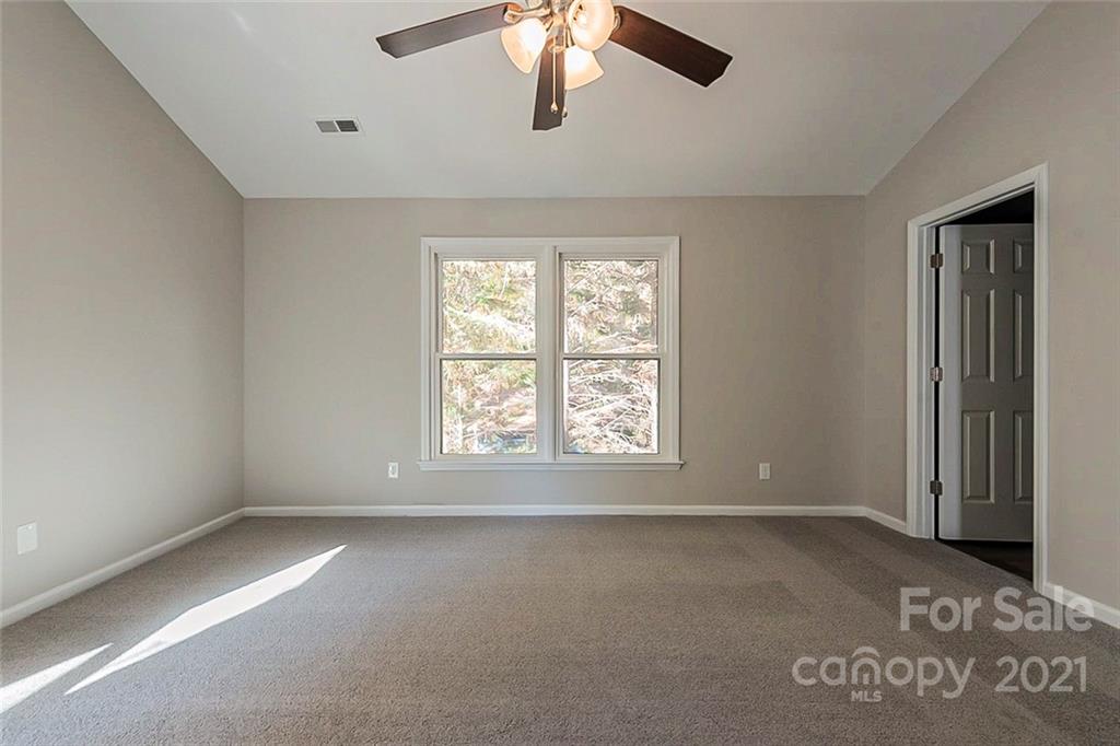 2115 Bon Villa Way Tega Cay, SC 29708 - Photo 8 of 15 a view of an empty room with a window