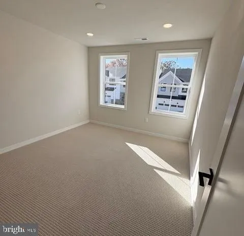 a view of outdoor space with garden and trees