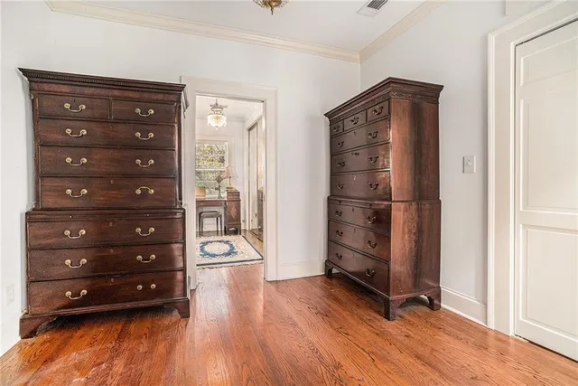 a view of a refrigerator in kitchen and wooden floor