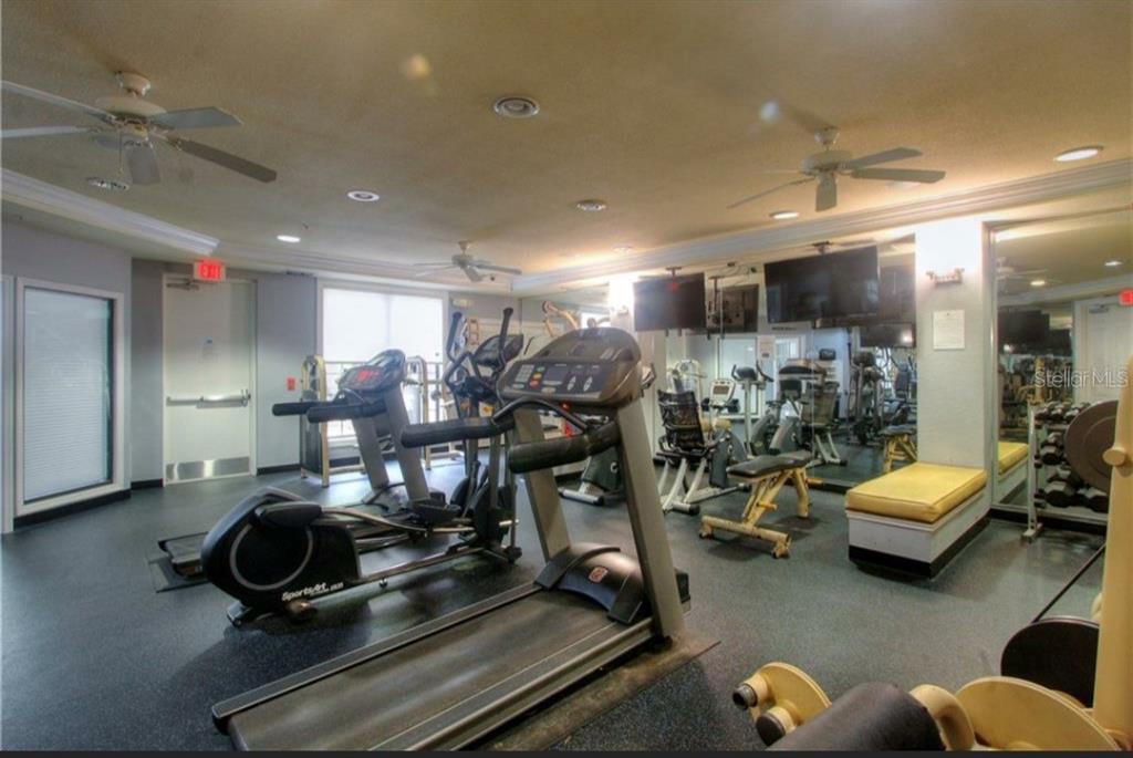 5550 East Michigan Street, Unit 3120 Orlando, FL 32822 - Photo 16 of 17 a view of a room with gym equipment
