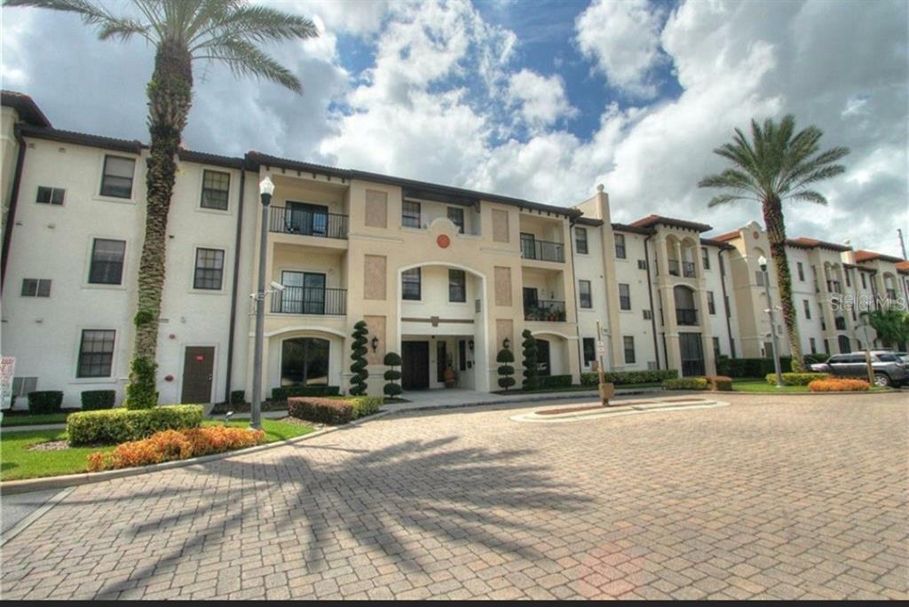 5550 East Michigan Street, Unit 3120 Orlando, FL 32822 - Photo 2 of 17 a front view of a building with street view and building