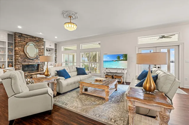 a kitchen with kitchen island a sink stainless steel appliances and cabinets
