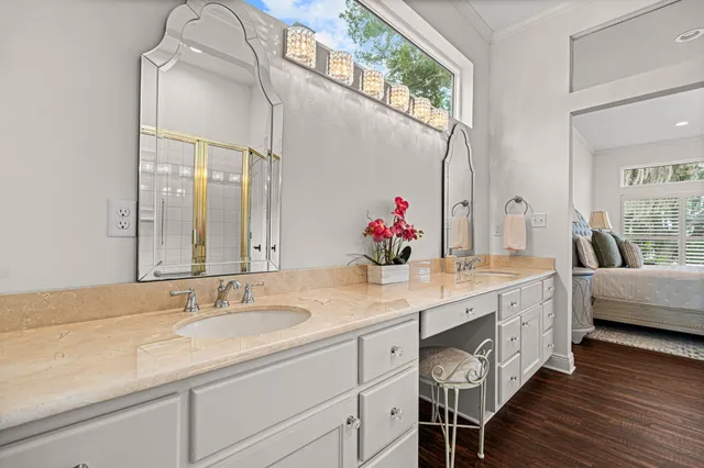 wooden floor with a stove and a mirror