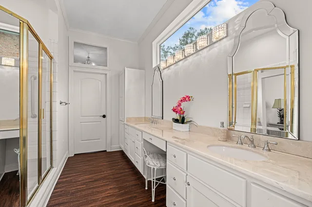 a bed room with a bed and a chandelier