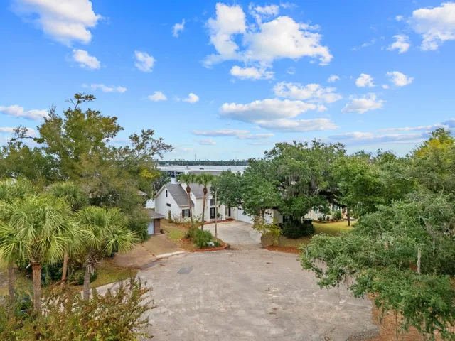 an aerial view of house with a yard