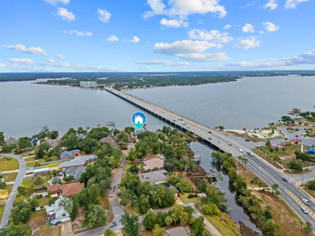 a picture of a bench in front of a wall
